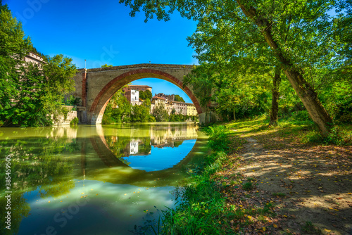 Ponte della Concordia, Roman bridge and river Metauro. Fossombrone, Marche, Italy. photo