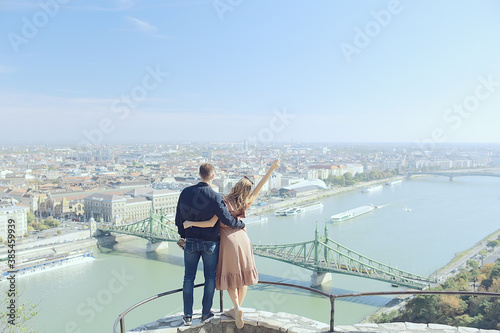 lovers boy and girl view of budapest panorama, gellert hill in budapest, hungary