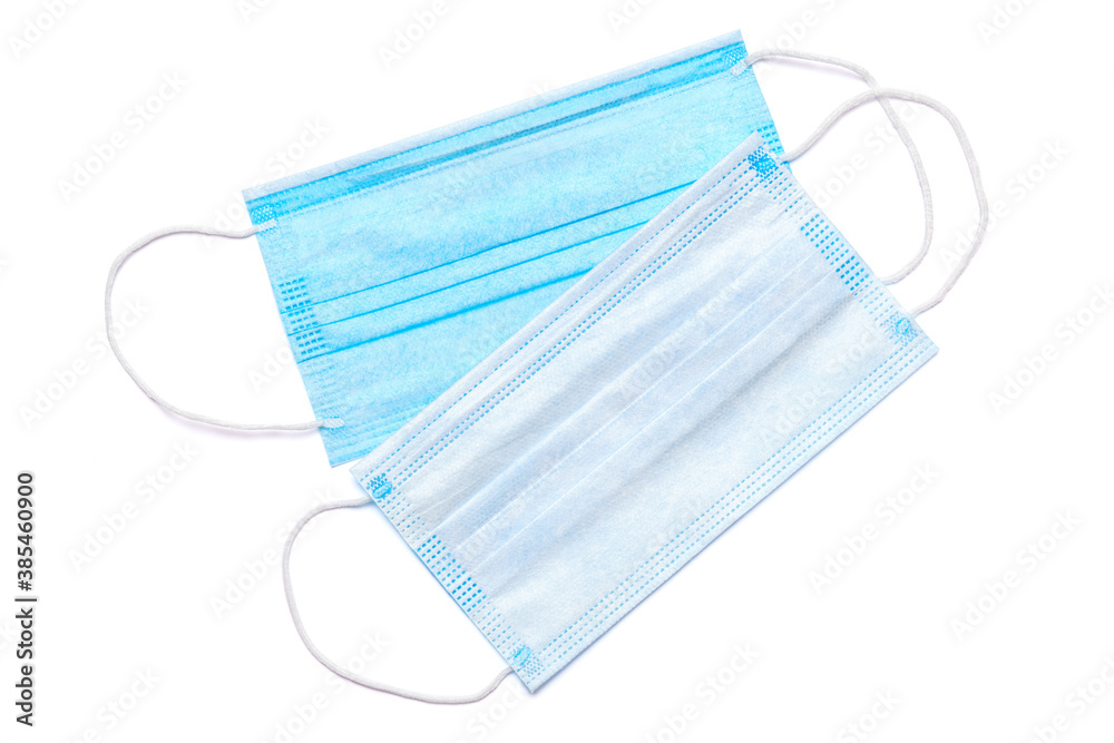 Disposable blue medical face mask isolated on white background with clipping path Disposable blue medical face mask isolated on white background with clipping path