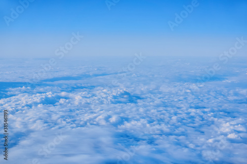 cloudscape - continuous cumulus clouds, top view © Evgeny