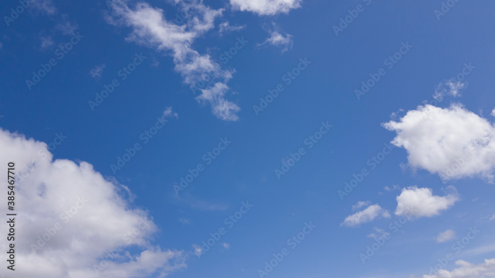 Obraz premium white clouds floating in blue sky