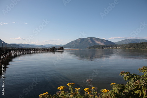 View of Shuswap lake with wooden wharf at Salmon Arm, British Columbia, Canada