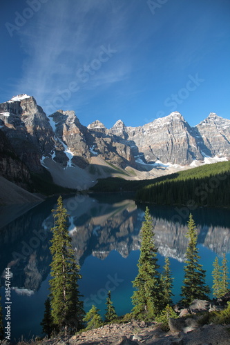 View of The Moraine Lake with snow covered mountain peaks during summer in Banff National Park  Canadian Rockies  Alberta  Canada.