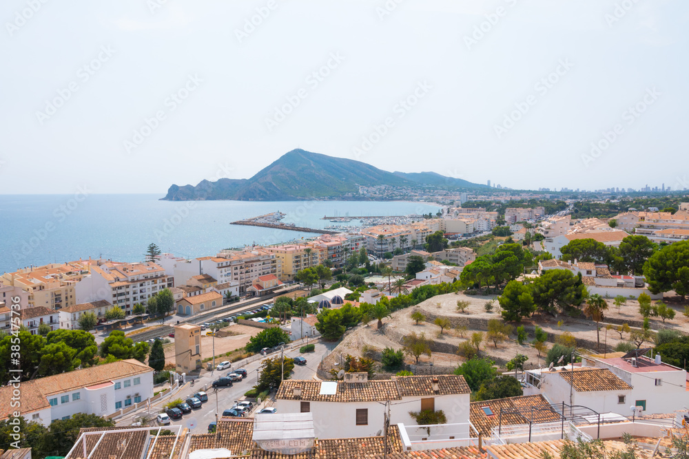 Beautiful seaview, panorama of Altea. Historical old town center with Serra Gelada and the mediterranean sea in the background. Alicante province, Valencian community, Spain.