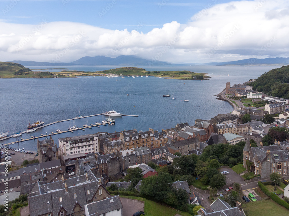 Aerial view of Oban with sea and mountain in the background