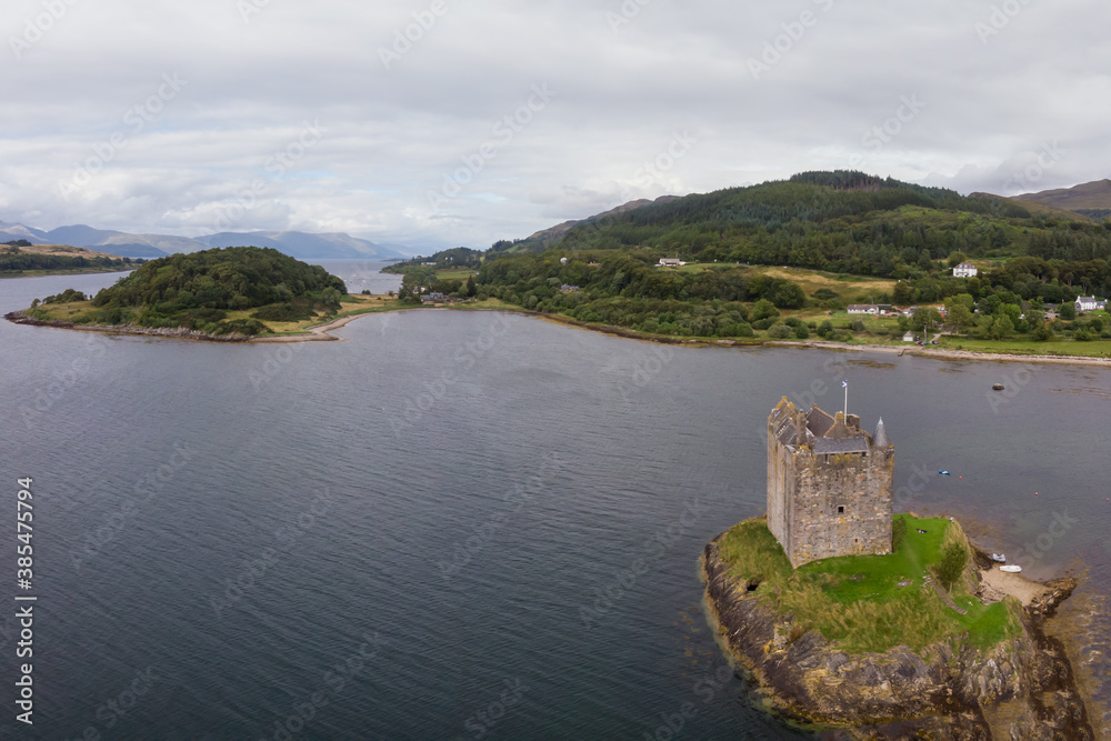 Aerial view of Castle Stalker with Loch Linnhe in the background