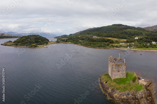Aerial view of Castle Stalker with Loch Linnhe in the background