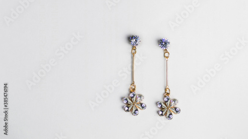 Designer Ear Stud White Gem with Golden Hanging Star Shape