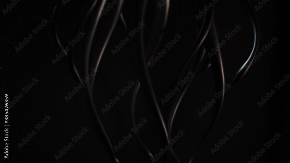 Dark abstraction of spinning tentacles like a jellyfish or snakes. The concept of an evil dark monster.