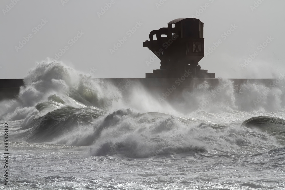 Old Titan crane in a stormy day