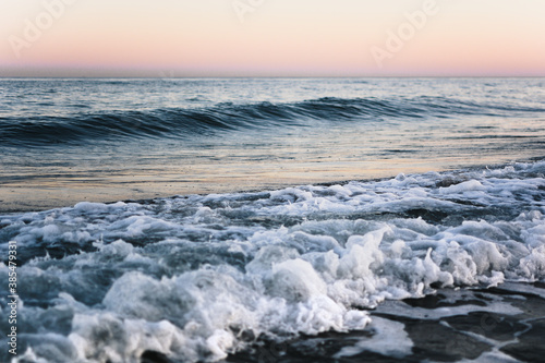 Sea beach water with waves. View of sea water with waves of the Black sea in local beach in Zatoka in Ukraine.