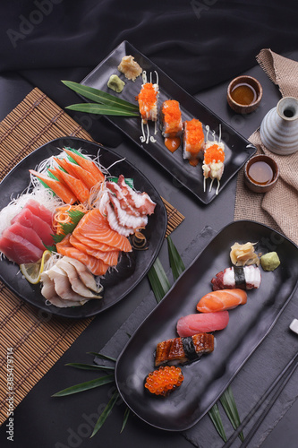 Sashimi and sushi Japanese food set. Salmon, Ikura, wasabi, fish, shrimp and tuna.