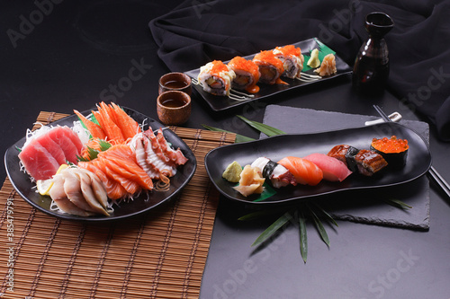 Sashimi and sushi Japanese food set. Salmon, Ikura, wasabi, fish, shrimp and tuna.
