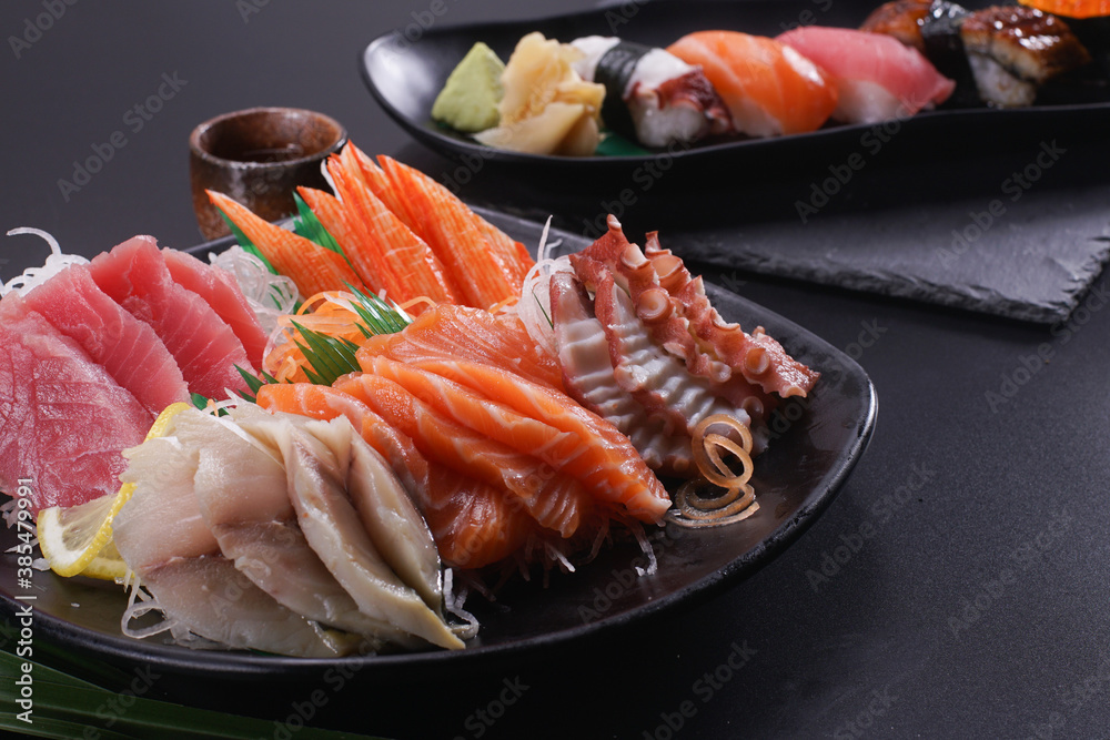 Sashimi Japanese food, Sashimi set. Salmon, wasabi, fish, shrimp. Sashimi Japanese food, Sashimi set. Salmon, wasabi, fish, shrimp.