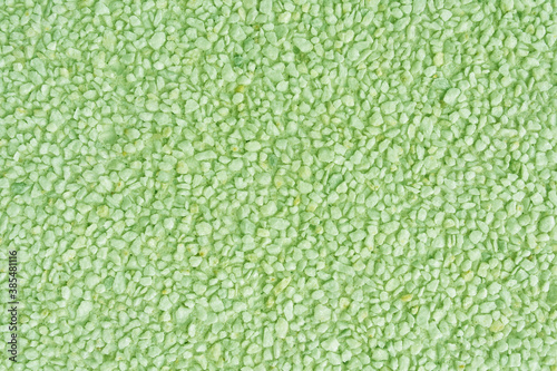 Green texture background in different shades, from dark green to light green. For design and surface coating.