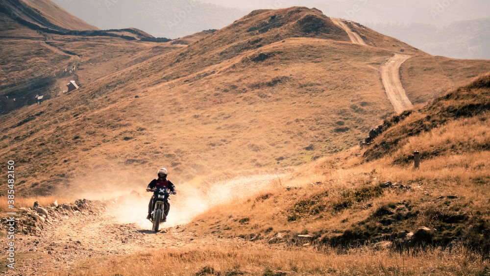 Crossing the mountains on a motocross dirt bike Crossing the mountains on a motocross dirt bike