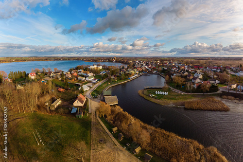 Aerial view of Rajgrodzkie Lake, Castle Mountain and Rajgrod during autumn time, Poland