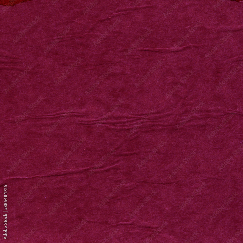 Fototapeta premium Red vintage and old looking crumpled paper background. Retro cardboard texture. Grunge paper for drawing. Ancient book page. Present wrapping.