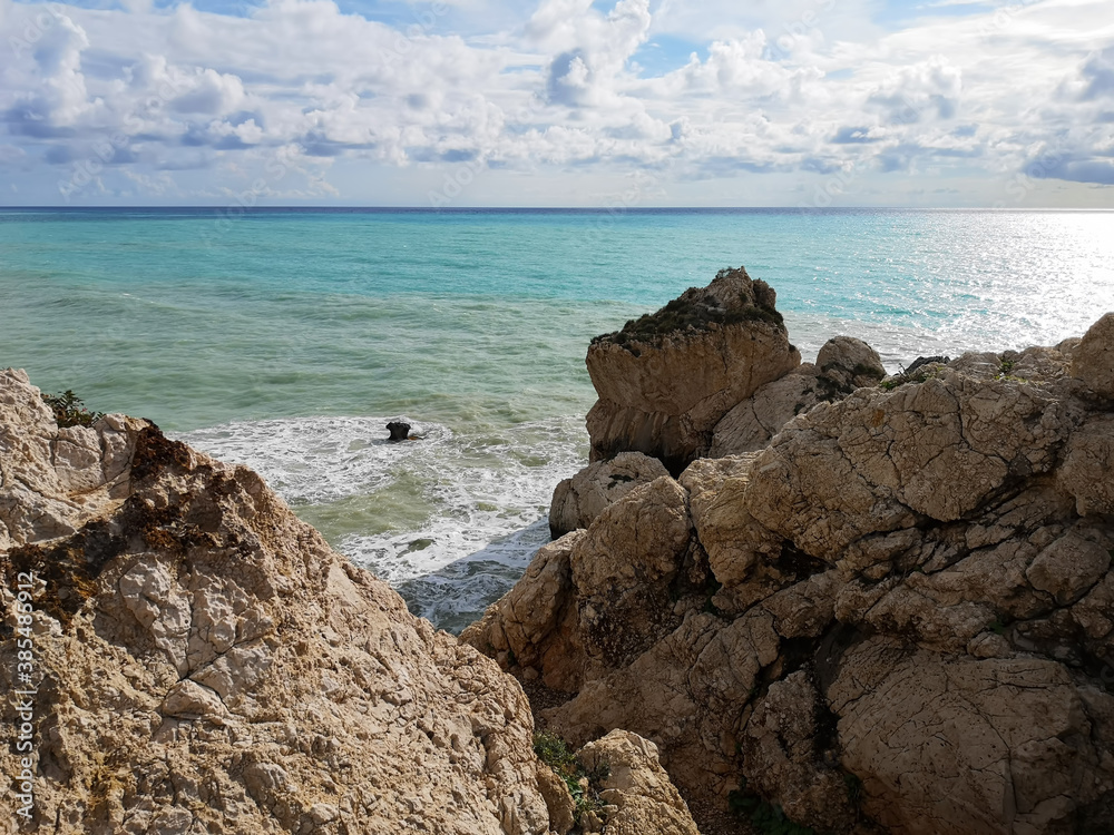 A sunny December day in Petra tou Roumiou Beach. The Rock of Aphrodite, Cyprus Island.