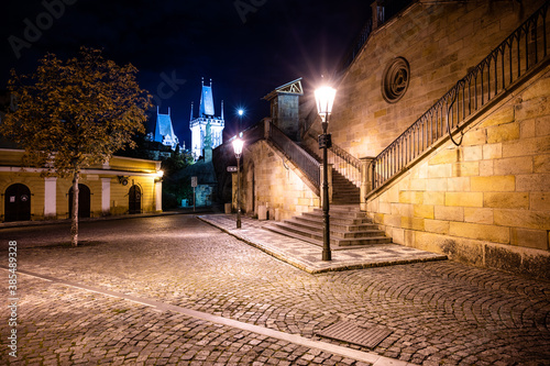 Historical staircase at Charles Bridge by night photo