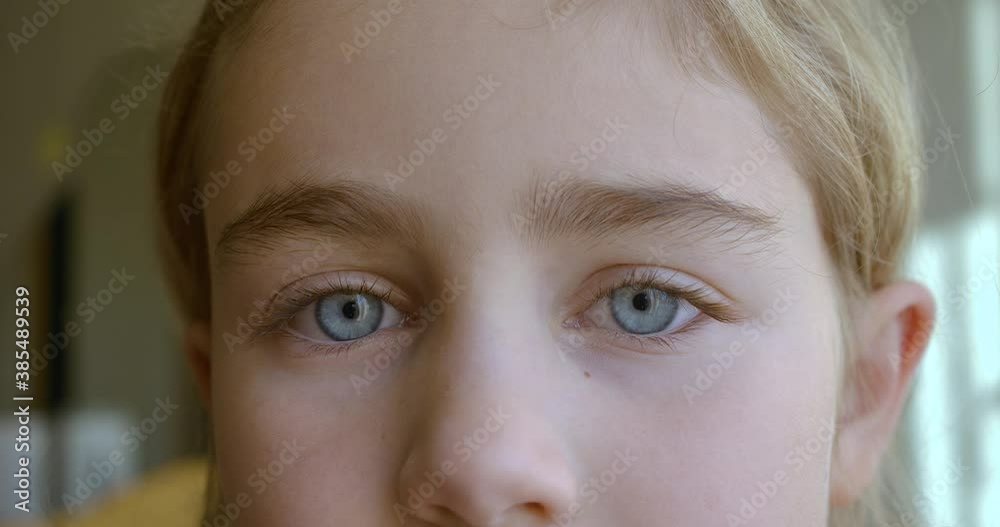 Portrait Little Child Girl With Blue Eyes Looking at Camera. Young Sad Thinking Curiosity Child Looking at Camera Closeup Outdoors. Face Eyes Serious Contemplative Child. Portrait Little Child Girl With Blue Eyes Looking at Camera. Young Sad Thinking Curiosity Child Looking at Camera Closeup Outdoors. Face Eyes Serious Contemplative Child.
