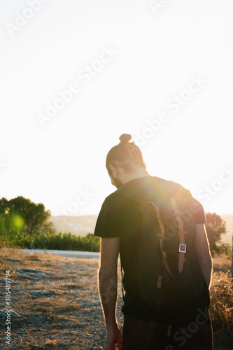Man standing at sunset