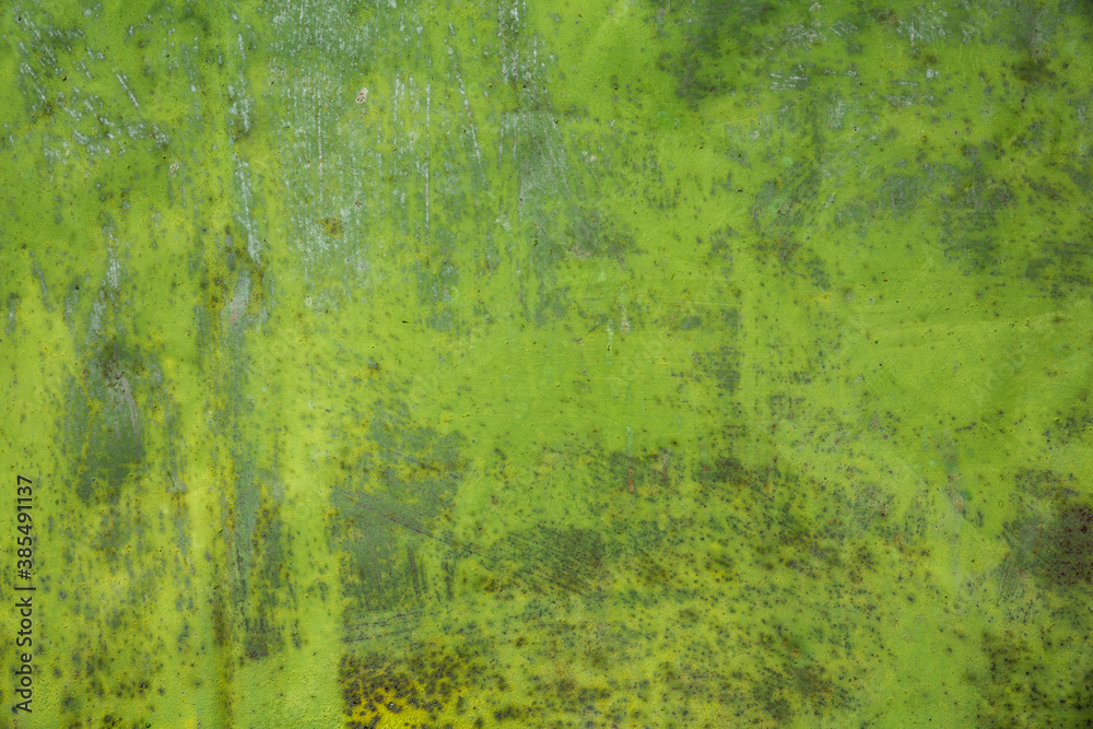 Green paint and rust on the old iron. Background, texture. Green paint and rust on the old iron. Background, texture.