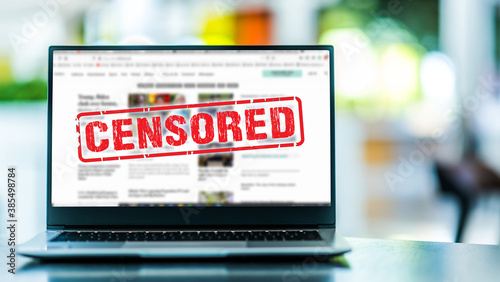 Laptop displaying the sign of censorship on the internet photo