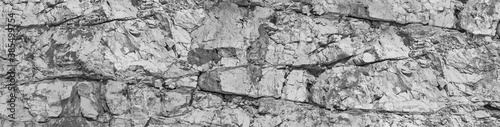 Solid particles fragments, gaps split, cavity, groove track on sharp stones. Debris pieces, scratch marks on cut ruined rock blocks.Gray dirt bump map, old grunge steep cliff for 3d grayscale backdrop