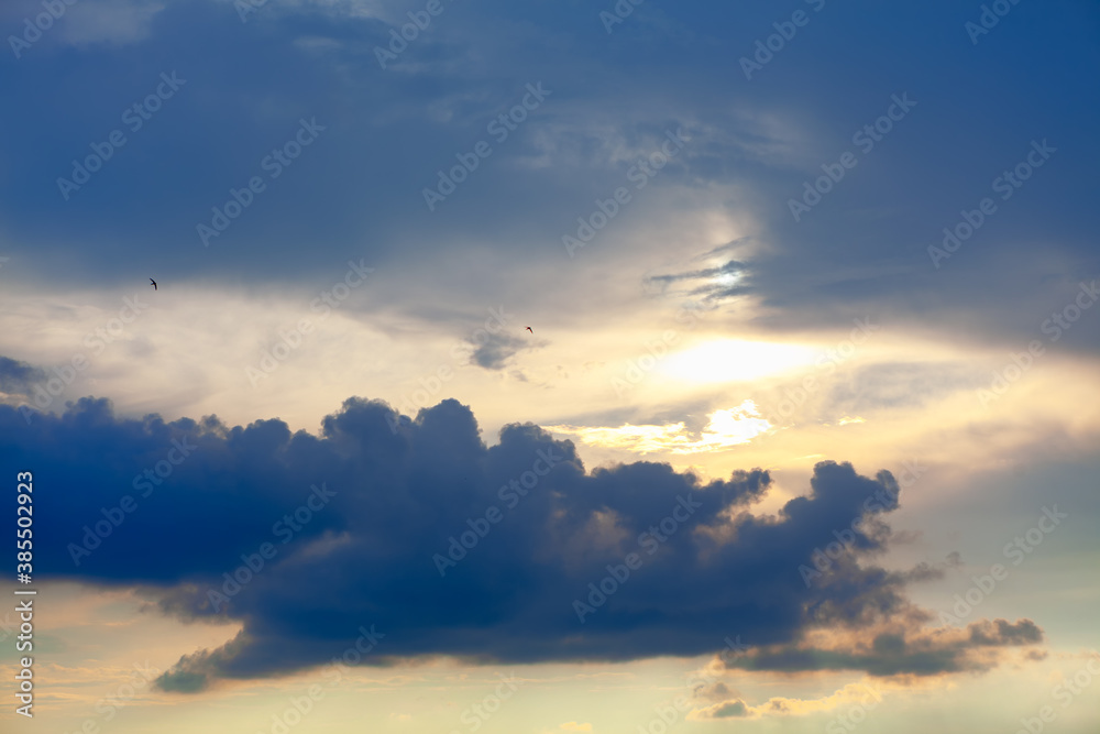 Fototapeta premium fantastic heaven with dark clouds at dusk