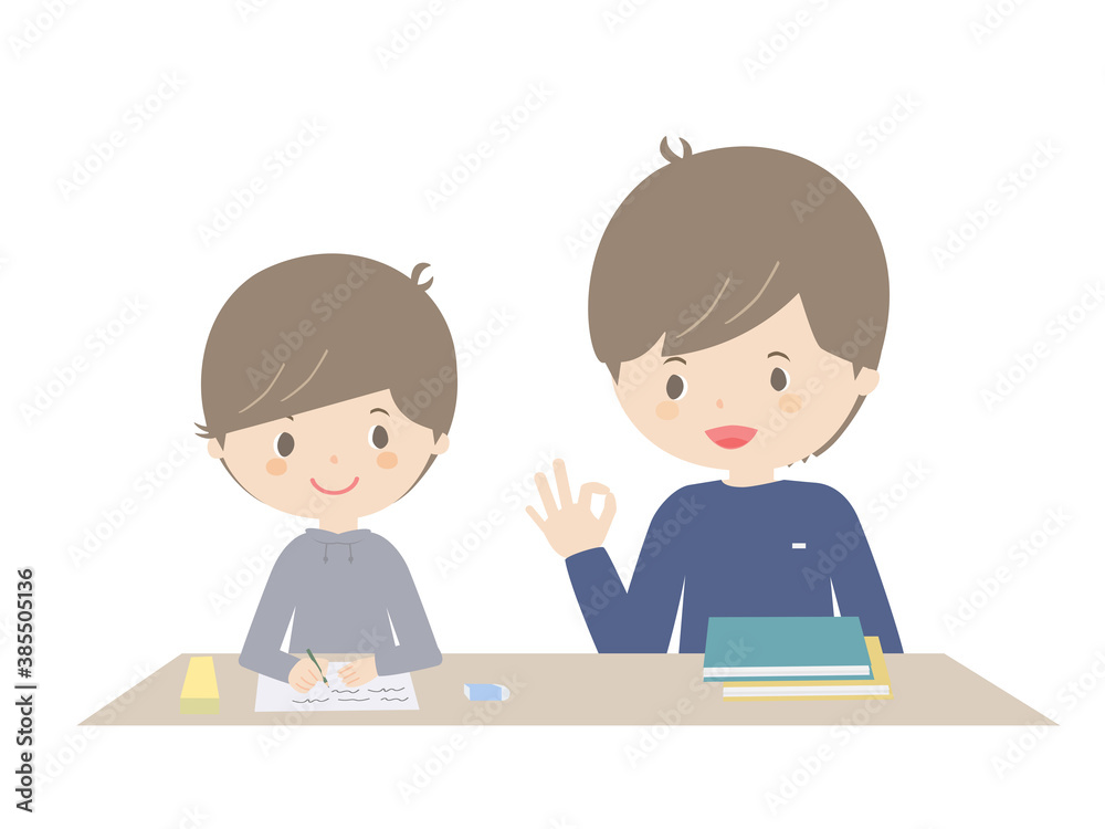 Boy doing homework with his father Boy doing homework with his father