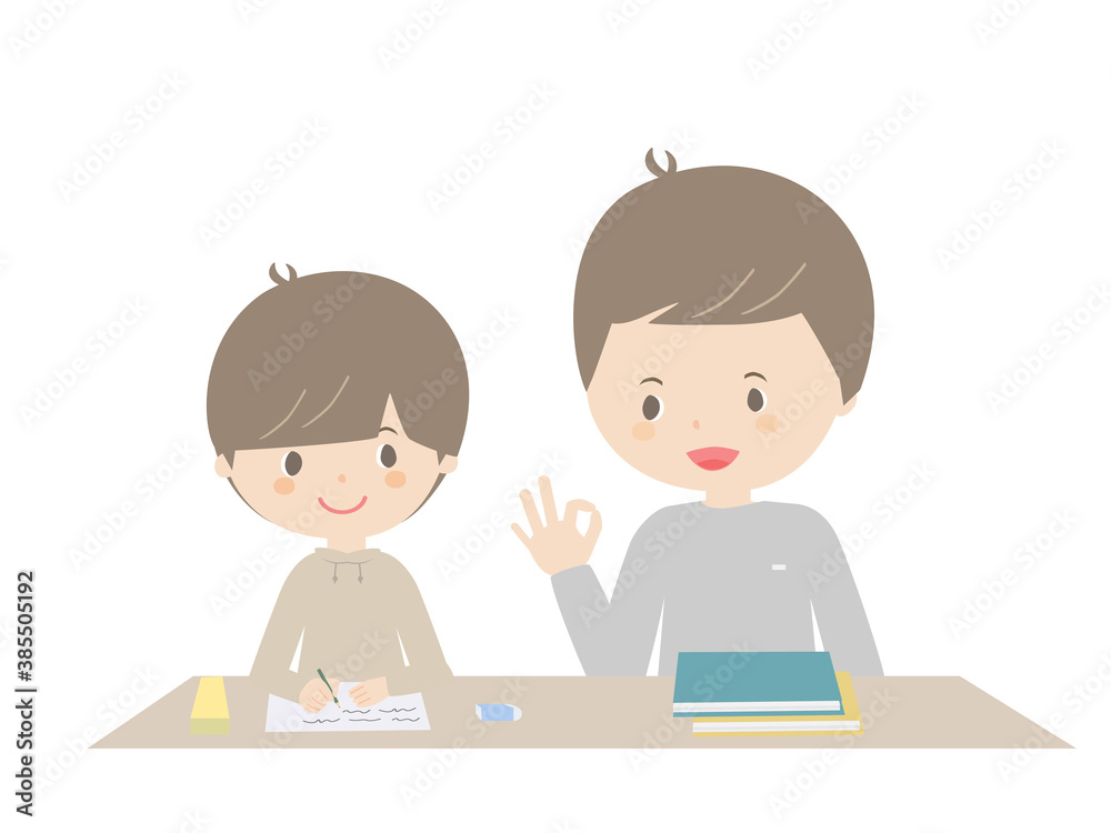 Boy doing homework with his father Boy doing homework with his father