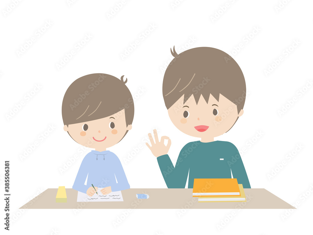 Boy doing homework with his father Boy doing homework with his father