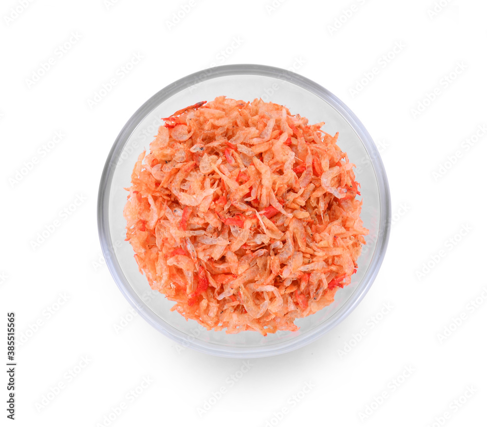 Dried small shrimp in glass bowl isolated on white background. Dried small shrimp in glass bowl isolated on white background.