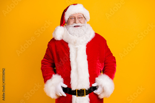 Photo of positive excited santa claus enjoy fairy jolly holly x-mas christmas celebration party wear red costume isolated over bright shine color background
