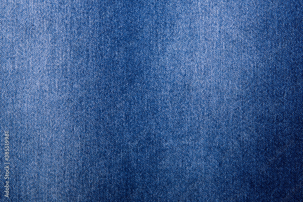 Texture of dark grated denim as background. Close-up