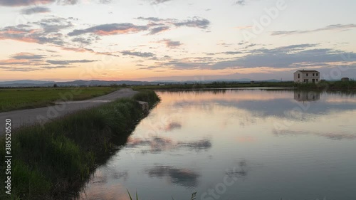 Sunset over a flooded rice field. Valencia, Spain