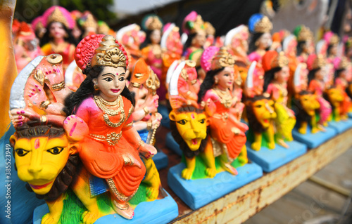 Idols of Goddess Durga sitting on Lion. The nine-day Durga Puja festival, which commemorates the slaying of the demon king Mahishasur by the goddess Durga, marks the triumph of good over evil.