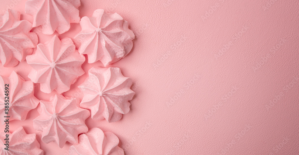 Pink meringues on a delicate pink background. Background idea