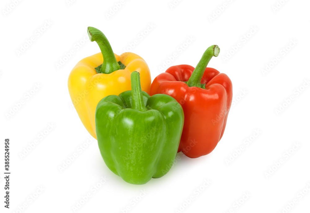 Red, green and yellow bell peppers isolated on white background. Red, green and yellow bell peppers isolated on white background.