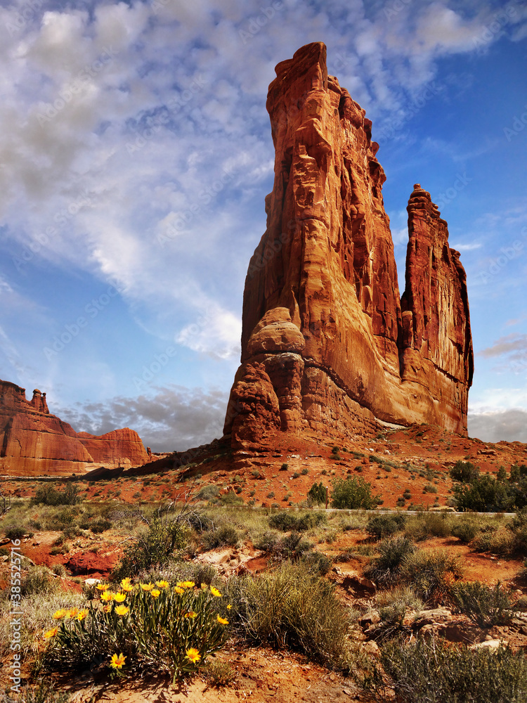 Famous Courthouse rock tower formation in desert landscape. Arches national Park, Utah.