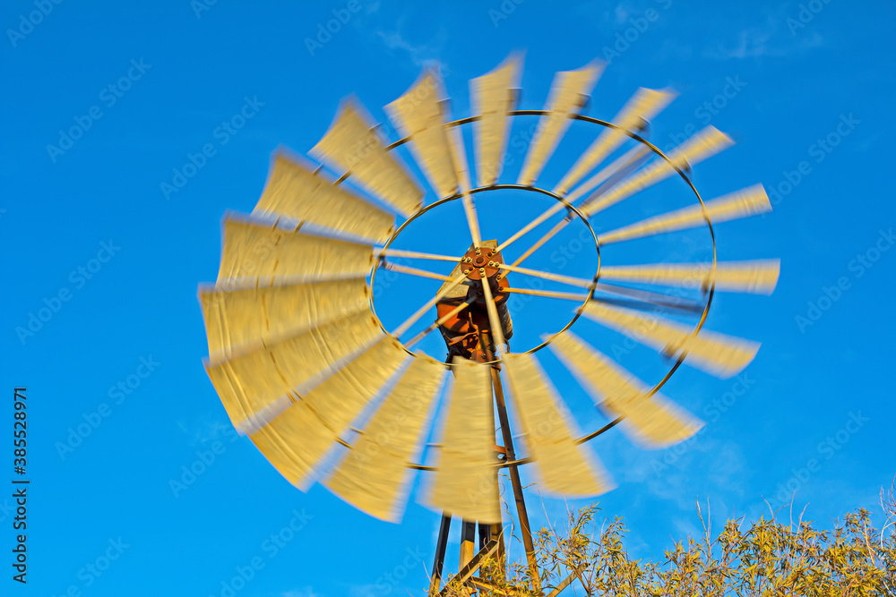 Traditional water pumping windmill spinning