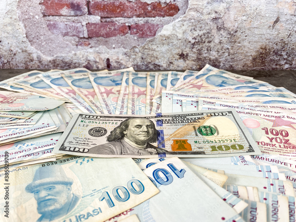 Turkish Liras and one hundred American Dollar. Turkish lira depreciates against the US dollar