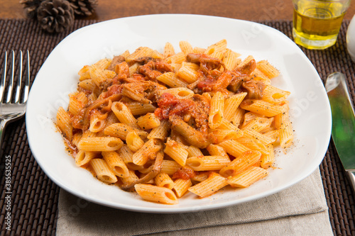 italian pasta penne whit mushrooms and tomato sauce vegan e vegetarian dish