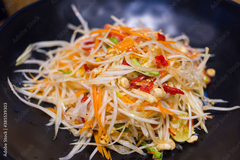Thai papaya salad is delicious as the national of Thailand. Food tastes spicy, sour, sweet, salty. Thai papaya salad is delicious as the national of Thailand. Food tastes spicy, sour, sweet, salty.