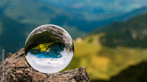 Crystal ball alpine landscape shot at the famous Wendelstein near Bayrischzell, Bavaria, Germany
