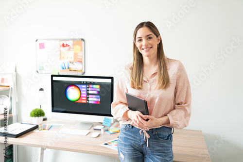 Woman working as an illustrator in her office