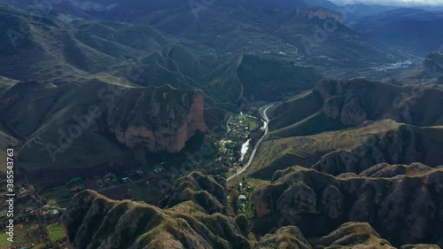 Amazing landscape of mountains and small village photo