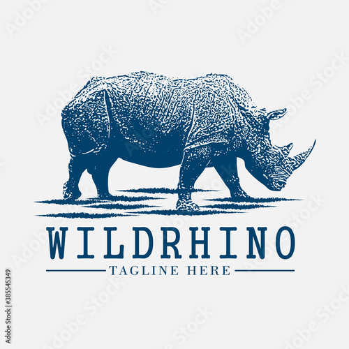 wild rhino vintage logo design, animal, illustration, graphic, nature, vector, symbol, wildlife, icon, rhinoceros, sign, art, safari, isolated, africa, mammal, horn, silhouette, zoo, retro, african