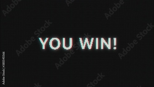 You Win text message appear on old display. Pixeled text animated on retro monitor with chromatic abberations. 4k 60 fps